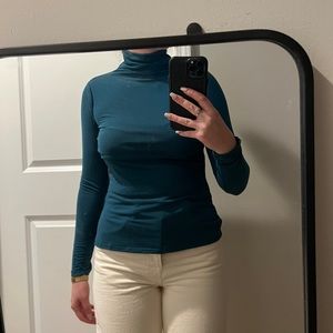 Just Fab dark blue turtle neck top